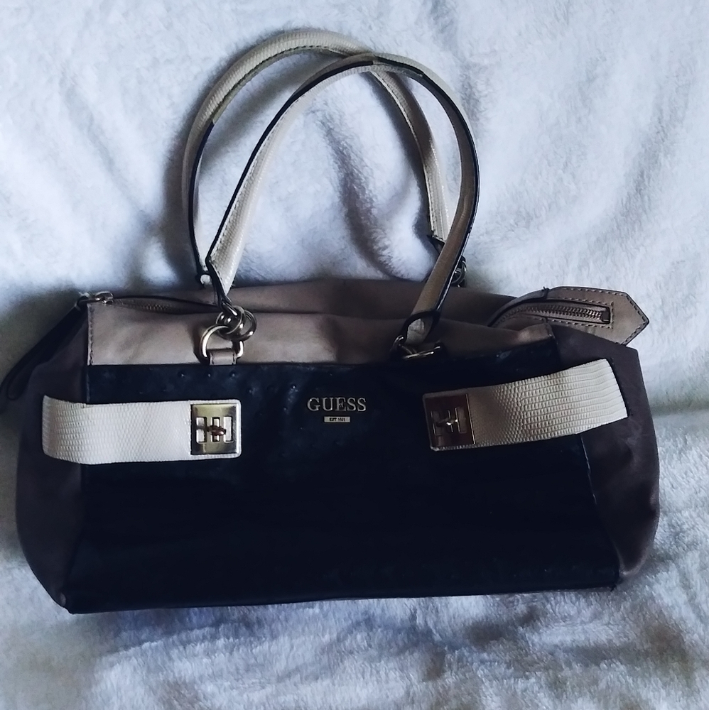 Guess black Ostrich, beige, and tan pocket book